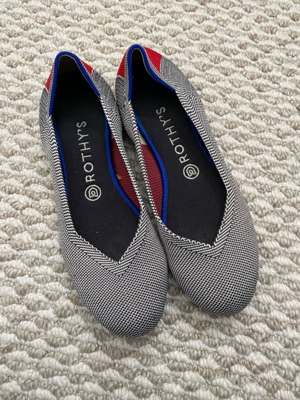 Rothy's Black & White Knit Ballet Flat with Blue Trim and Red Inset